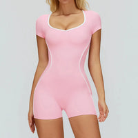 Body dos nu color block pour femme, tissu stretch et séchage rapide, design sportif moderne et confortable.